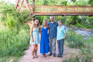 Littleton high school senior photographer Heritage Class of 2026 Colorado photography nature sunset swimmer violin family little brother Morrison 