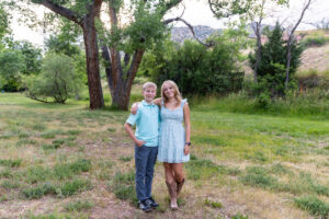 Littleton high school senior photographer Heritage Class of 2026 Colorado photography nature sunset swimmer violin little brother family Morrison