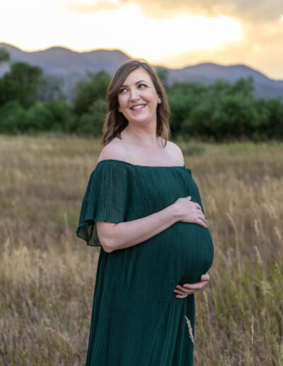 Littleton family and maternity photographer photo session Harriman Lake Colorado sunset baby bump big brother little sister photography summer water foothills