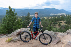 Littleton high school senior photographer Colorado mountain bike biker Colorado photography Mt. Falcon Park sunset mountain views teen teenager boy