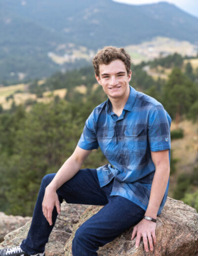 Littleton high school senior photographer Colorado mountain bike biker Colorado photography Mt. Falcon Park sunset mountain views teen teenager boy
