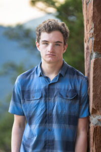 Littleton high school senior photographer Colorado mountain bike biker Colorado photography Mt. Falcon Park sunset mountain views teen teenager boy class of 2026