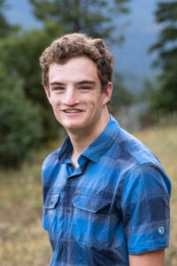 Littleton high school senior photographer Colorado mountain bike biker Colorado photography Mt. Falcon Park sunset mountain views teen teenager boy