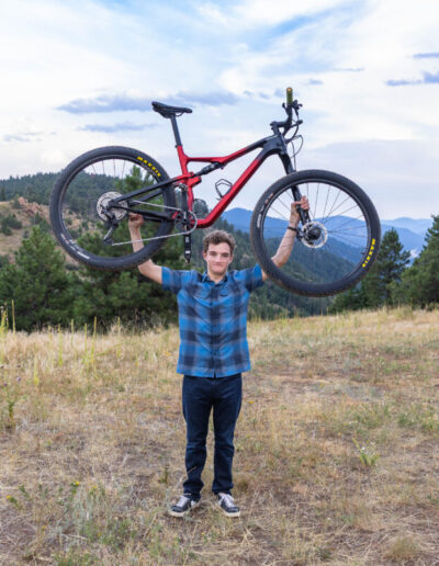 Littleton high school senior photographer Colorado mountain bike biker Colorado photography Mt. Falcon Park sunset mountain views teen teenager boy