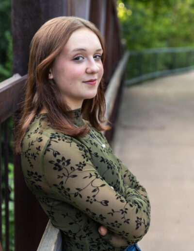 Littleton high school senior photographer teenager Downtown Morrison urban Lair O' the Bear Park nature water river bridge sabre sword flag team photography sunset Colorado foothills