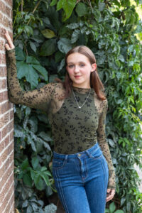 Littleton high school senior photographer teenager Downtown Morrison urban Lair O' the Bear Park nature water river bridge sabre sword flag team photography sunset Colorado foothills