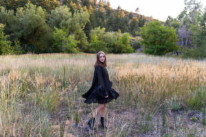 Littleton high school senior photographer teenager Downtown Morrison urban Lair O' the Bear Park nature water river bridge sabre sword flag team photography sunset Colorado foothills