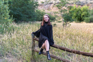 Littleton high school senior photographer teenager Downtown Morrison urban Lair O' the Bear Park nature water river bridge sabre sword flag team photography sunset Colorado foothills