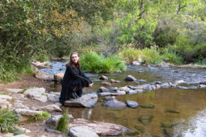 Littleton high school senior photographer teenager Downtown Morrison urban Lair O' the Bear Park nature water river bridge sabre sword flag team photography sunset Colorado foothills