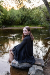 Littleton high school senior photographer teenager Downtown Morrison urban Lair O' the Bear Park nature water river bridge sabre sword flag team photography sunset Colorado foothills