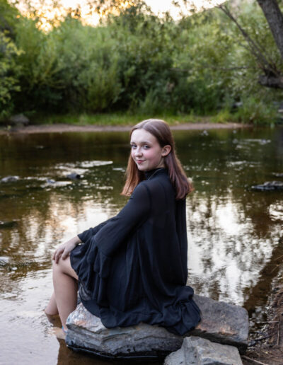 Littleton high school senior photographer teenager Downtown Morrison urban Lair O' the Bear Park nature water river bridge sabre sword flag team photography sunset Colorado foothills