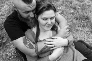 Littleton engagement photographer wedding marriage engaged couple in love future bride and groom Morrison park river water red rocks Mt. Falcon photography Colorado Wisconsin ring summer