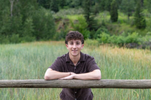 Littleton high school senior photographer Colorado Morrison photography Lair O' the Bear Park nature viola urban fence