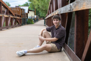 Littleton high school senior photographer Colorado Morrison photography Lair O' the Bear Park nature viola urban bridge
