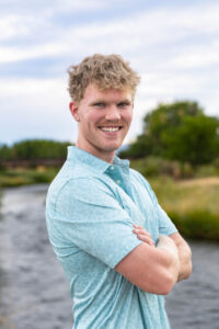Littleton high school senior photographer Carson Nature Center Colorado lacrosse player Dakota Ridge teenager boy teen sunset bridge friend