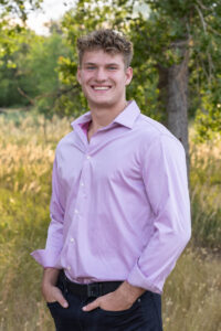 Littleton high school senior photographer Carson Nature Center Colorado lacrosse player Dakota Ridge teenager boy teen sunset bridge friend