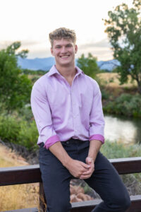 Littleton high school senior photographer Carson Nature Center Colorado lacrosse player Dakota Ridge teenager boy teen sunset bridge friend
