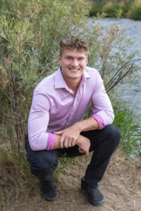 Littleton high school senior photographer Carson Nature Center Colorado lacrosse player Dakota Ridge teenager boy teen sunset bridge friend