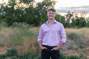 Littleton high school senior photographer Carson Nature Center Colorado lacrosse player Dakota Ridge teenager boy teen sunset bridge friend