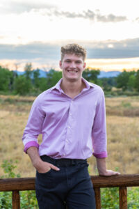 Littleton high school senior photographer Carson Nature Center Colorado lacrosse player Dakota Ridge teenager boy teen sunset bridge friend