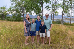 Littleton family photographer Harriman Lake Lakewood Colorado foothills water photography boys brothers parents mountain views sunset