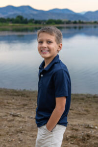 Littleton family photographer Harriman Lake Lakewood Colorado foothills water photography boys brothers parents mountain views sunset