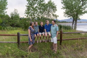 Littleton family photographer Harriman Lake Lakewood Colorado foothills water photography boys brothers parents mountain views sunset