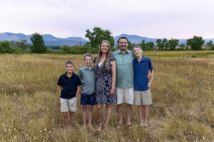 Littleton family photographer Harriman Lake Lakewood Colorado foothills water photography boys brothers parents mountain views sunset