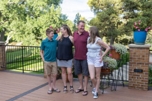 Littleton high school senior photographer Heritage class of 2026 dance dancer ballet pointe shoes family photography house home brother sister siblings Colorado