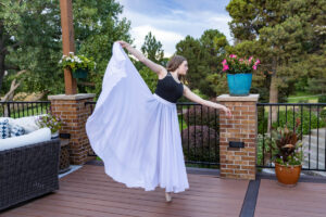 Littleton high school senior photographer Heritage class of 2026 dance dancer ballet pointe shoes family photography house home brother sister siblings Colorado