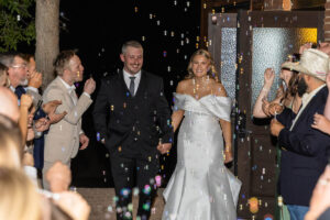 Littleton wedding photographer Colorado bride and groom photography bubble exit marriage married husband wife Pinecrest venue Palmer Lake
