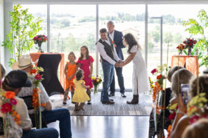 Littleton wedding photographer Journey church couples photography Colorado bride and groom married marriage family flowers bouquet ceremony pastor