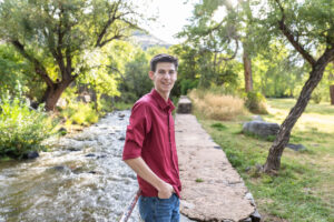 Littleton high school senior photographer Colorado Chatfield cross country Morrison photography water river bridge engineering family sister brother dog sunset