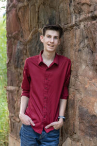 Littleton high school senior photographer Colorado Chatfield cross country Morrison photography water river bridge engineering family sister brother dog sunset