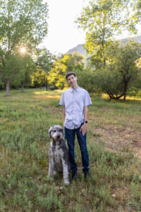 Littleton high school senior photographer Colorado Chatfield cross country Morrison photography water river bridge engineering family sister brother dog sunset
