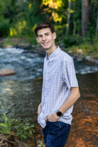 Littleton high school senior photographer Colorado Chatfield cross country Morrison photography water river bridge engineering family sister brother dog sunset