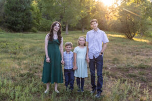 Littleton high school senior photographer Colorado Chatfield cross country Morrison photography water river bridge engineering family sister brother dog sunset golden light
