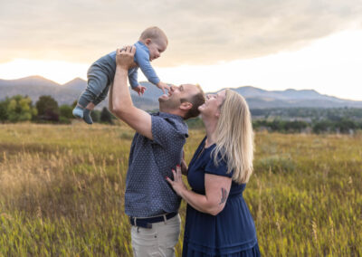 Littleton family photographer baby mother father sunset Colorado foothills photography
