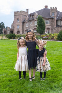 Littleton family photographer Highlands Ranch Mansion Colorado sisters mother father daughters girls fancy dresses photography flowers