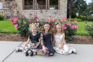 Littleton family photographer Highlands Ranch Mansion Colorado sisters mother father daughters girls fancy dresses photography flowers