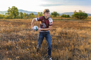 Littleton high school senior photographer Colorado Harriman Lake Dakota Ridge foothills sunset rugby photography sister mother father family