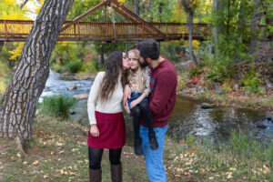 Littleton family photographer mini sessions Morrison Park fall photography Colorado dogs puppies couples mother father kids children siblings bridge river color brother sister baby