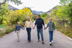 Littleton family photographer mini sessions Morrison Park fall photography Colorado dogs puppies couples mother father kids children siblings bridge river color brother sister baby