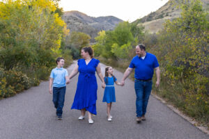 Littleton family photographer mini sessions Morrison Park fall photography Colorado dogs puppies couples mother father kids children siblings bridge river color brother sister baby