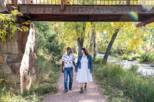 Littleton family photographer mini sessions Morrison Park fall photography Colorado dogs puppies couples mother father kids children siblings bridge river color brother sister baby