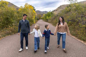 Littleton family photographer mini sessions Morrison Park fall photography Colorado dogs puppies couples mother father kids children siblings bridge river color brother sister baby