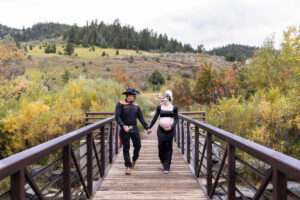 Littleton maternity and baby photographer family bump pregnant pregnancy Lair O' the Bear Park Colorado photography fall color leaves cowboy hats