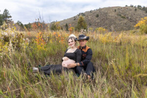 Littleton maternity and baby photographer family bump pregnant pregnancy Lair O' the Bear Park Colorado photography fall color leaves cowboy hats