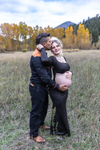 Littleton maternity and baby photographer family bump pregnant pregnancy Lair O' the Bear Park Colorado photography fall color leaves cowboy hats
