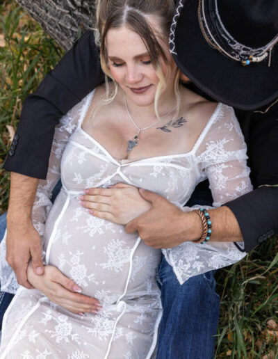 Littleton maternity and baby photographer family bump pregnant pregnancy Lair O' the Bear Park Colorado photography fall color leaves cowboy hats